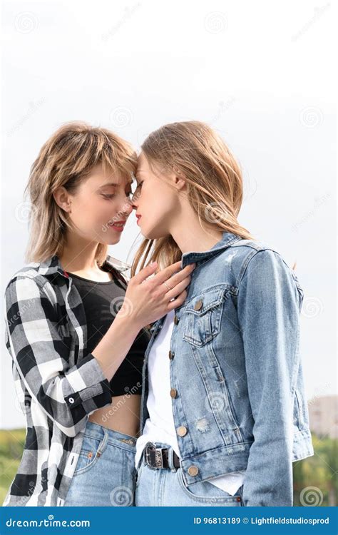 lesbians sloppy kissing|Authentic LGBT female lesbian couple kissing each other in slow。